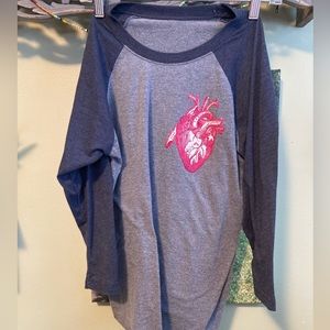 Size medium baseball tee with anatomical heart detail